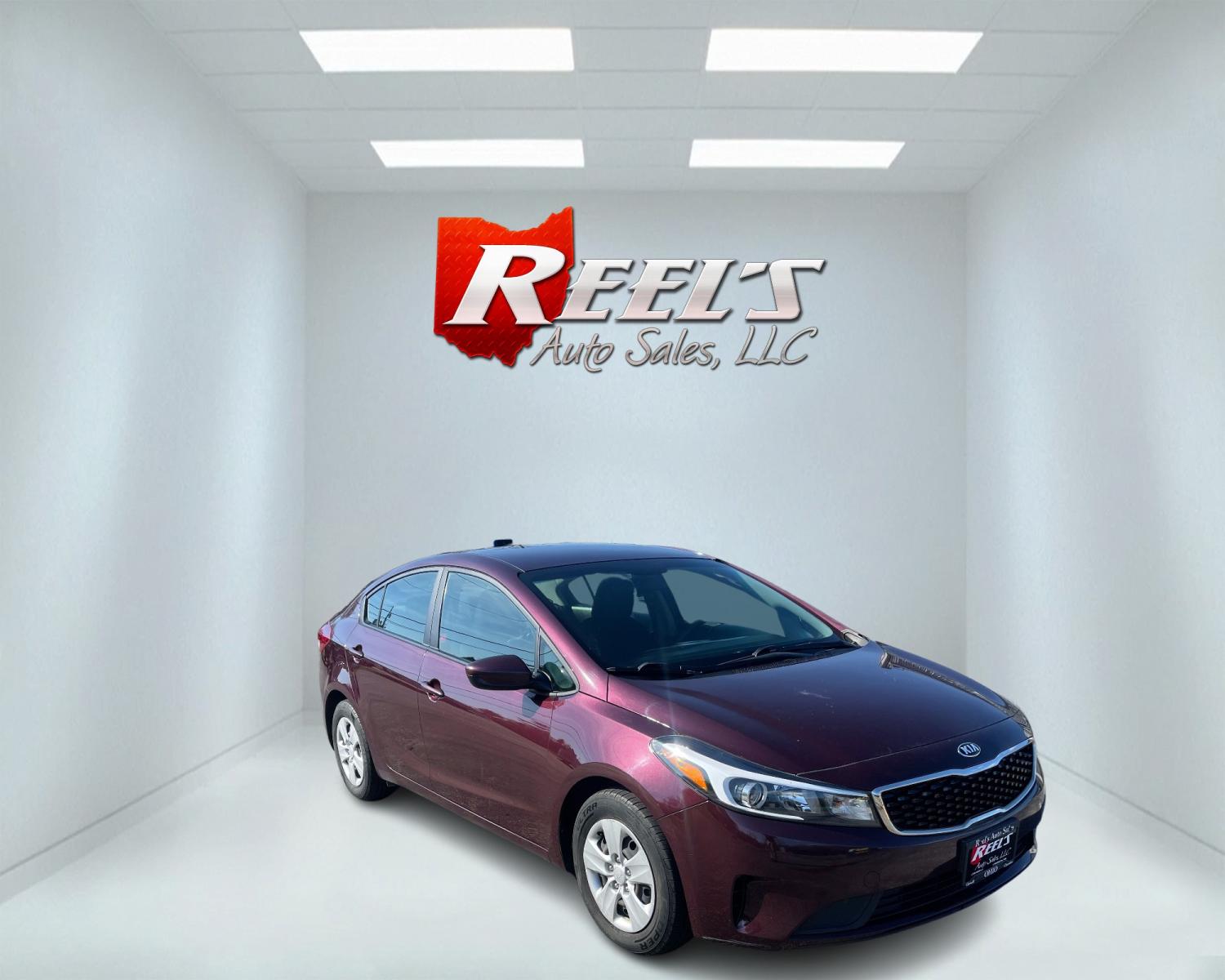 2017 Red /Black Kia Forte LX 6A (3KPFK4A76HE) with an 2.0L I4 DOHC 16V engine, 6A transmission, located at 11115 Chardon Rd. , Chardon, OH, 44024, (440) 214-9705, 41.580246, -81.241943 - This 2017 Kia Forte LX is a well-equipped compact sedan with a 2.0-liter four-cylinder engine paired with a smooth-shifting six-speed automatic transmission. It offers convenient features like daytime running lights, USB audio input, and Bluetooth connectivity for seamless audio streaming. Additiona - Photo #2